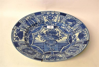 Lot 98 - An Arita Porcelain Dish, in Kraak style, painted in underglaze blue with a jardinière of...