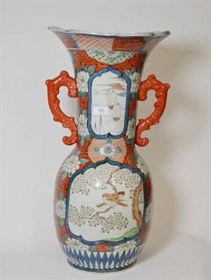 Lot 101 - An Imari Porcelain Alcove Vase, Meiji period (1868-1912), the trumpet neck with twin handles...