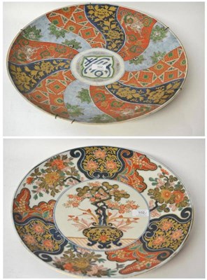 Lot 102 - An Imari Porcelain Dish, Meiji period (1868-1912), typically painted with a jardinière of...
