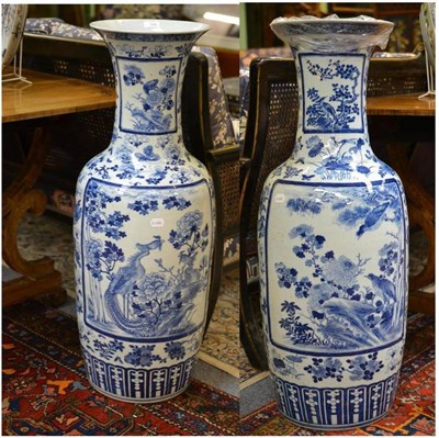 Lot 130 - A Pair of Chinese Porcelain Large Baluster Vases, 19th century, with trumpet necks, painted in...