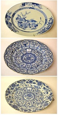 Lot 134 - A Chinese Porcelain Charger, Qianlong period, painted in underglaze blue with foliage and...