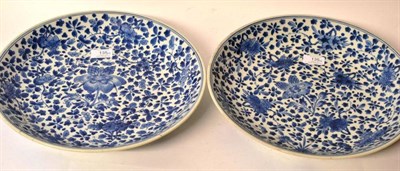 Lot 135 - A Pair of Chinese Porcelain Saucer Dishes, 18th century, painted in underglaze blue with a...