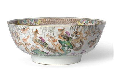 Lot 143 - A Chinese Porcelain Punch Bowl, Qianlong, painted in famille rose enamels with a profusion of birds