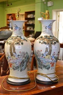 Lot 145 - A Pair of Chinese Porcelain Baluster Vases, in 18th century style, with trumpet necks, painted...