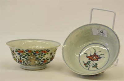 Lot 157 - A Pair of Chinese Wucai Porcelain Bowls, with everted rims, painted with foliage and rockwork,...