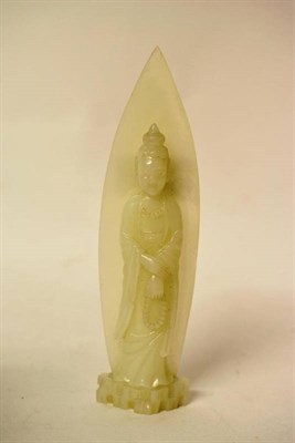 Lot 169 - A Carved Jade Figure of Bijin, 19th century, standing on a rocky base before a lappet shaped...