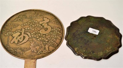 Lot 186 - A Chinese Bronze Mirror, in Tang style, of hexagonal form with ogee rim, 20cm diameter; and A...