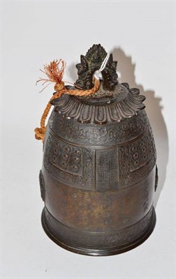 Lot 187 - A Chinese Bronze Temple Bell, of archaic form cast with a dragon handle and a band of scrolls...