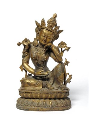 Lot 190 - A Chinese Bronze Figure of Buddha, in 17th century style, the seated figure with foliate crown...