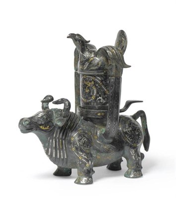 Lot 192 - A Chinese Bronze Incense Burner, in archaic style, in the form of a standing ox, the burner...