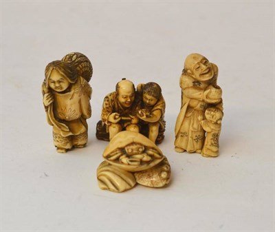 Lot 203 - A Japanese Ivory Netsuke, early 20th century, as a hermit crab on a shell base, signed, 3.5cm;...