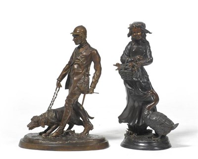 Lot 223 - A Bronze Figure of a Huntsman, standing wearing a cap, jacket and plus-fours, a short sword at...