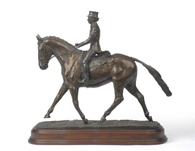 Lot 224 - Caroline Wallace: A Bronze Study of HRH Princess Anne on a Dressage Horse, on a textured shaped...