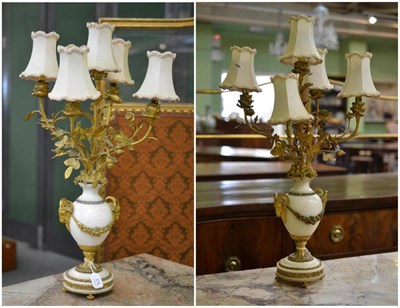 Lot 278 - A Pair of Gilt Metal Mounted White Marble Lamp Bases, in George III style, issuing five...