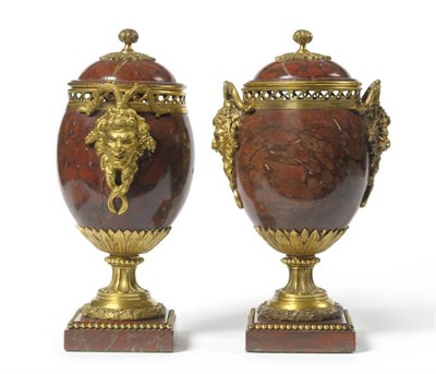 Lot 282 - A Pair of Gilt Metal Mounted Breche Marble Urns and Covers, 19th century, the domed covers with...