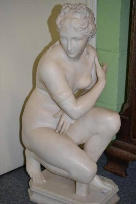 Lot 284 - A Carved White Marble Figure of Venus, by G Niccolla, late 19th/early 20th century, kneeling...