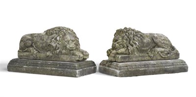 Lot 287 - A Pair of Composition Figures of Lions, after Canova, the recumbent beasts on rectangular...