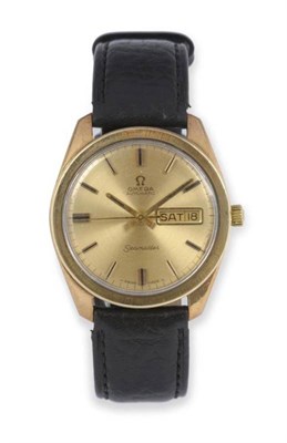 Lot 303 - A 9ct Gold Automatic Calendar Centre Seconds Wristwatch, signed Omega, model: Seamaster, 1968,...