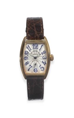 Lot 320 - A Lady's 18ct Gold Tonneau Shaped Wristwatch, signed Franck Muller, Geneve, model: Sunset 1750...