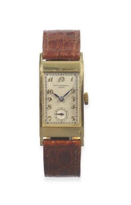 Lot 322 - A Rare 18ct Gold Curved Rectangular Wristwatch, signed Patek Philippe & Co, Geneve, Ref: 425, 1937