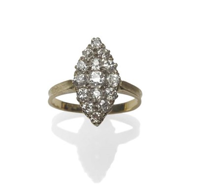 Lot 367 - A Diamond Navette Cluster Ring, set with old cut diamonds in white and yellow claw settings, to...