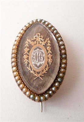 Lot 372 - A George III Mourning Brooch, of marquise form with a locket panel to the front containing hair...