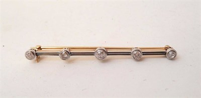 Lot 375 - An Early 20th Century Diamond Five Stone Bar Brooch, graduated old cut diamonds in white millegrain