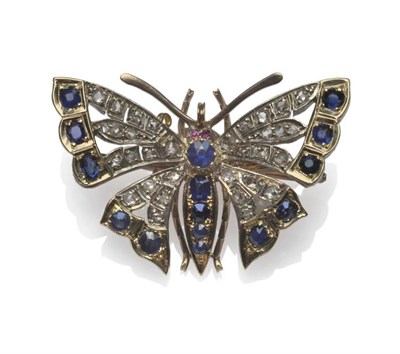 Lot 393 - A Late Victorian Butterfly Brooch, the eyes set with rubies, and the body with sapphires, the wings