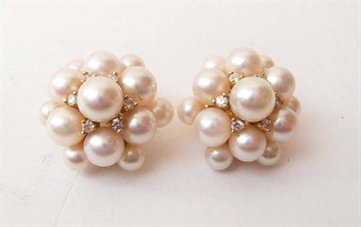 Lot 402 - A Pair of Cultured Pearl Earrings, the cultured pearls clustered with tiny diamond details...