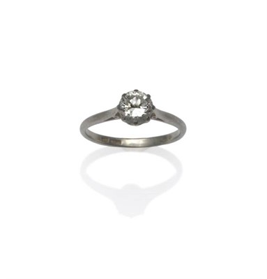 Lot 405 - A Diamond Solitaire Ring, the brilliant cut diamond in a white eight claw setting, to a tapered...