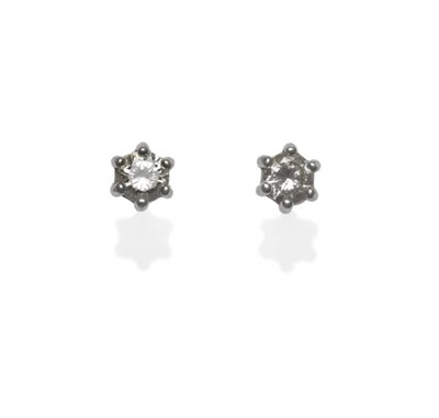 Lot 417 - A Pair of 18 Carat Gold Diamond Solitaire Stud Earrings, the round brilliant cut diamonds in...