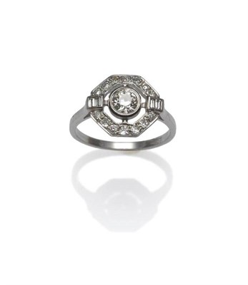 Lot 420 - An Art Deco Style Diamond Cluster Ring, an old cut diamond centrally, spaced to a border of...