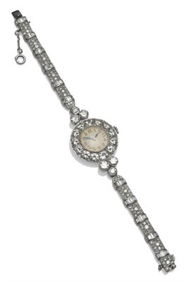 Lot 424 - An Art Deco Lady's Diamond Set Wristwatch, lever movement, dial with black Arabic numerals,...