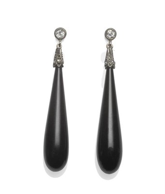 Lot 429 - A Pair of Onyx and Diamond Drop Earrings, an old cut diamond in a white collet setting suspends...