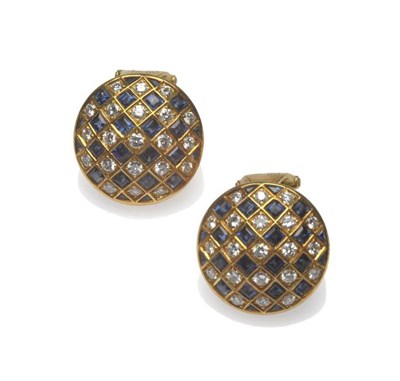 Lot 448 - A Pair of Sapphire and Diamond Earrings, of domed circular form, with square step cut sapphires and