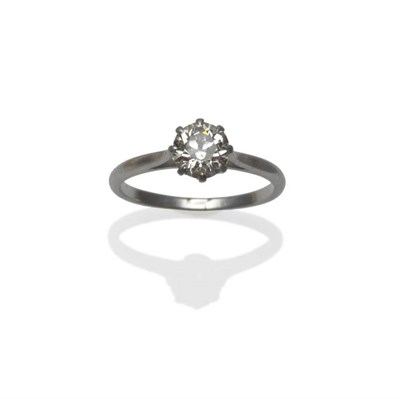 Lot 455 - A Diamond Solitaire Ring, the old brilliant cut diamond in a white eight claw setting, to a tapered