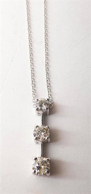 Lot 460 - A Diamond Necklace, three graduated round brilliant cut diamonds in white claw settings, on a...