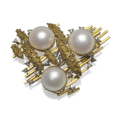 Lot 472 - A Mabe Pearl and Diamond Abstract Brooch, three mabe pearls in yellow collet settings, and...