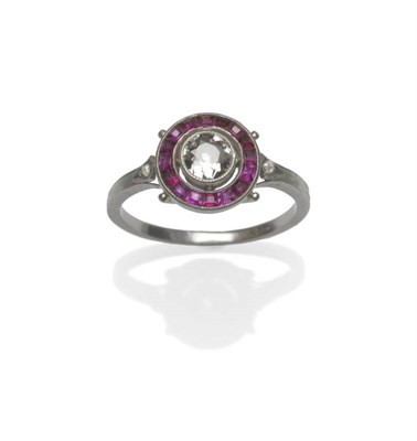 Lot 480 - A Diamond and Ruby Ring, circa 1930, an old cut diamond centrally spaced to a border of...