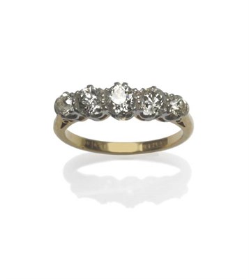 Lot 481 - A Diamond Five Stone Ring, graduated old brilliant cut diamonds in white claw settings, on a yellow