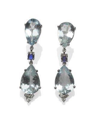 Lot 487 - A Pair of Aquamarine, Sapphire and Diamond Drop Earrings, two pear cut aquamarines chain linked...