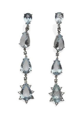 Lot 492 - A Pair of Aquamarine and Black and White Diamond Drop Earrings, a string of three pear cut...