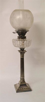 Lot 510 - An Electroplate Oil Lamp, early 20th century, of corinthian column form on a swept square base with