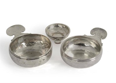 Lot 515 - Two French White Metal Wine Tasters, circa 1750-70, the circular bowls with crescent scroll and...