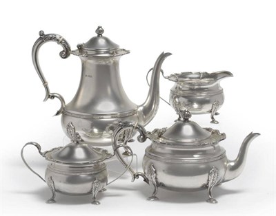 Lot 528 - An Elizabeth II Four Piece Silver Coffee Set, PP Ltd, Sheffield 1967, of bracketed circular cushion