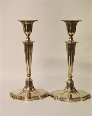 Lot 531 - A Pair of George V Silver Table Candlesticks, Walker & Hall, Sheffield 1930, of bracketed oval...