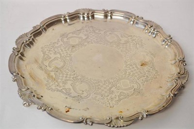 Lot 547 - An Edward VII Silver Salver, J Rodgers & Sons, Sheffield 1902, shaped circular on three cast...