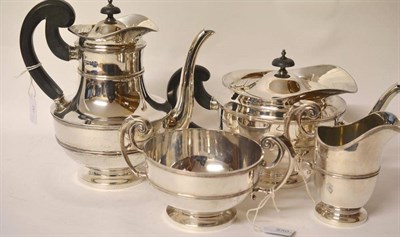 Lot 550 - A Victorian Four Piece Tea and Coffee Service, Walker & Hall, Sheffield 1898, of cape teapot...