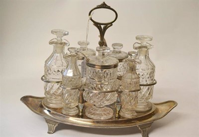 Lot 583 - A George III Silver Cruet Stand, John Emes, London 1802, of navette form, engraved with cursive...