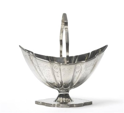 Lot 587 - A George III Silver Sugar Basket, Hester Bateman, London 1790, the indented navette shaped pedestal